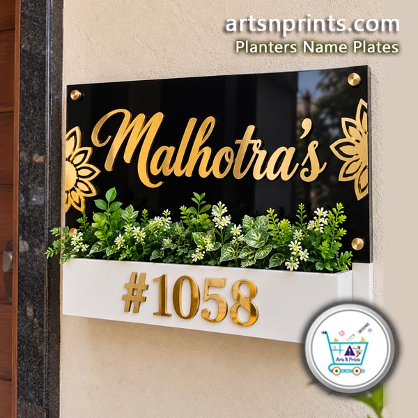Malhotra Rectangular Acrylic Planter Name Plate Exterior Wall Installation Rectangular black acrylic house name plate with gold lettering "Malhotra's" and house number 1058 mounted on an outdoor entryway wall with gold standoffs.